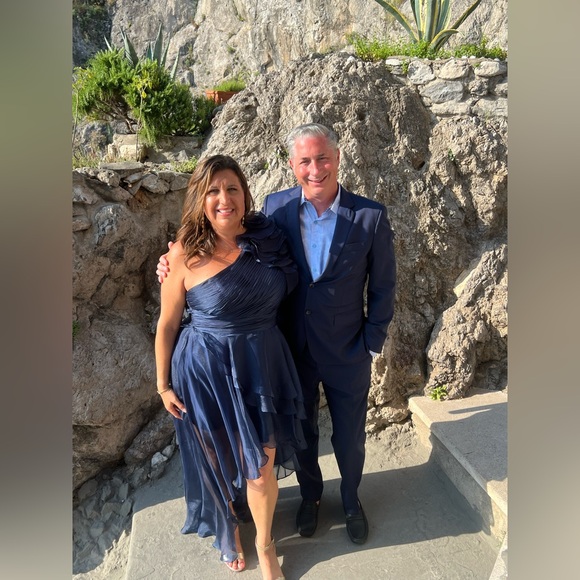 Rosette One- Shoulder High Low Gown. Color is Midnight. Size 14. - Picture 3 of 3